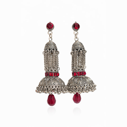 Oxidized silver jhumka earrings with red stones and traditional Indian design