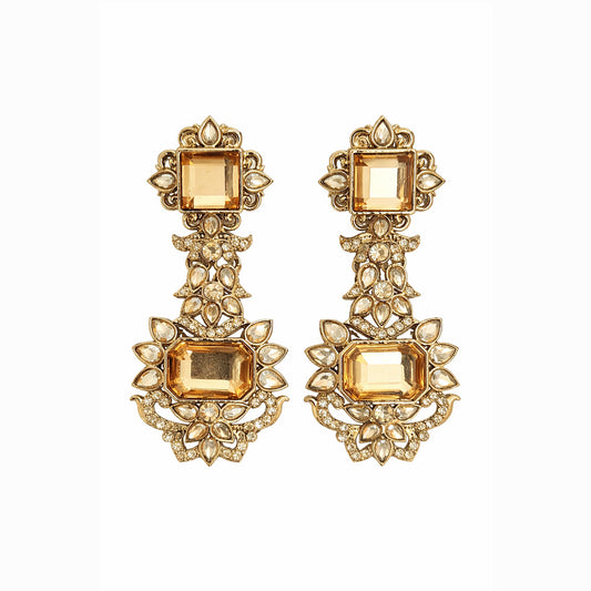 Gold statement chandelier earrings with champagne stones on white background