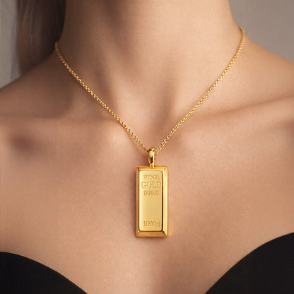 gold-bar-locket-nature-background